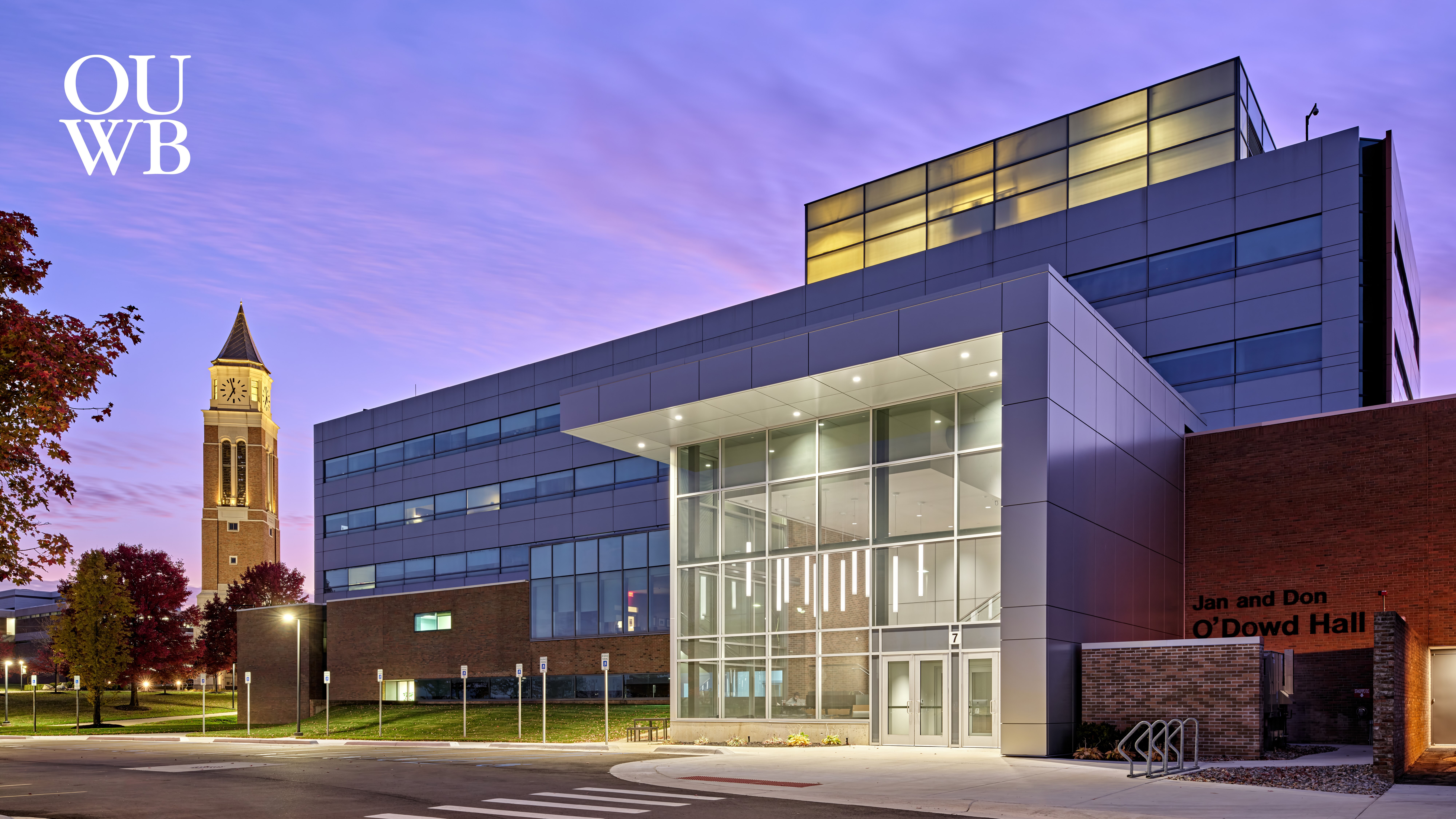 Dusk overview of a building at the Oakland University William Beaumont School of Medicine campus.